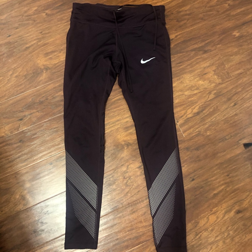 Purple Nike running leggings